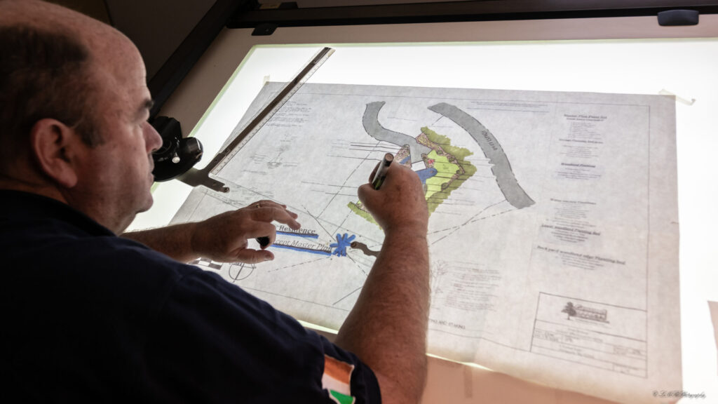 Sean Bishop, Landscape Architect and Owner, creating a custom Landscape Design for a homeowner in Cohasset, Massachusetts